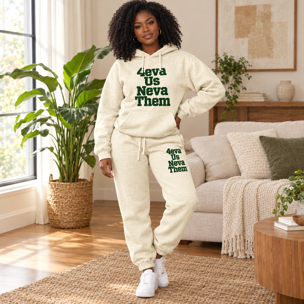 Standing Black woman in the cream-and-green jogger set