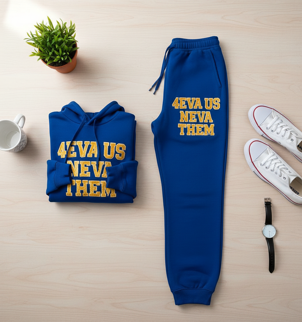Royal blue and gold jogger set - folded on table