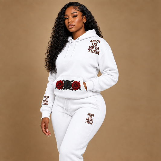 White hoodie and joggers with rose-and-rhinestone pocket design and dark embroidery